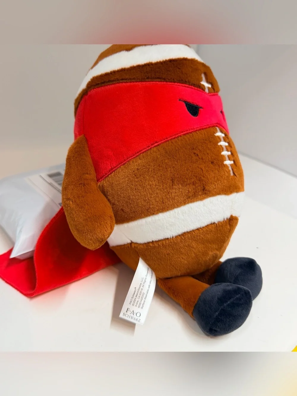 FAO Schwarz Brown Plush Football with Red Mask and Black Feet